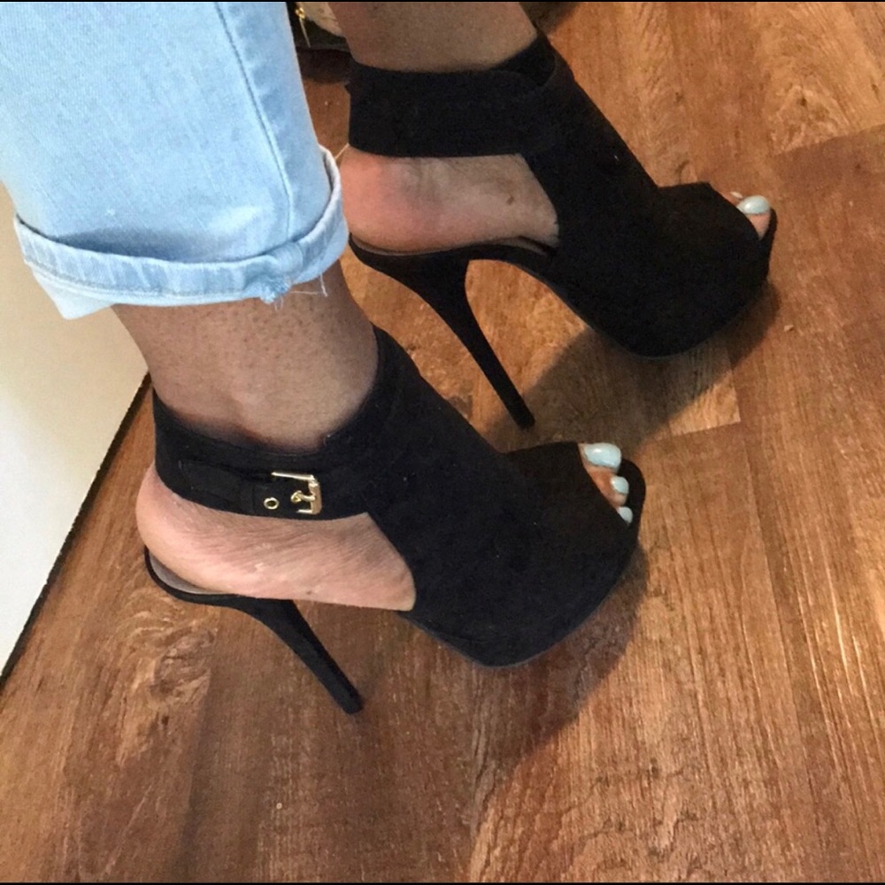 Black, open toe high heels.